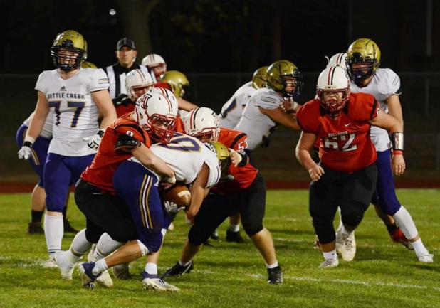 Bulldogs Beat Battle Creek 37-15 in C-1 Football Playoffs; Travel to Kearney Catholic This Friday